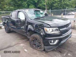 2017 Chevrolet Colorado 4WD Z71 z VIN 1GCGTDEN3H1205822, wystawiony jako IAAI lot #43050960 z przebiegiem 105 046 mil mil oraz . Historia ofert i sprzedaży dostępna na DreamBid. Obrazek 1.