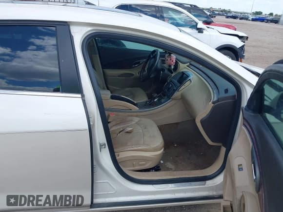 ✅ 2012 Buick LaCrosse Touring • VIN: 1G4GJ5E3XCF271124 • Lot: 43330310. Listed on IAAI with 168,070 mi. Free auction sales archive from the USA and detailed vehicle history report at DreamBid. Image 5.