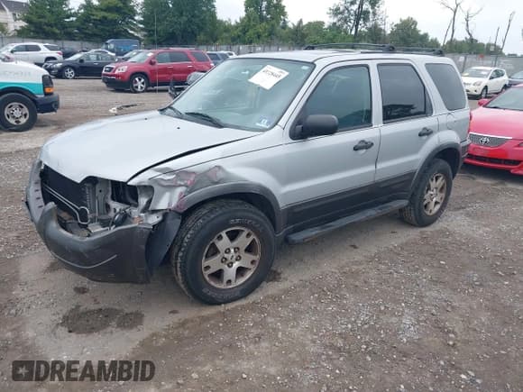 ✅ 2004 Ford Escape XLT • VIN: 1FMCU93154KB37497 • Lot: 43228445. Listed on IAAI with 145,512 mi. Free auction sales archive from the USA and detailed vehicle history report at DreamBid. Image 2.