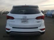 ✅ 2017 Hyundai Santa Fe Ultimate • VIN: 5XYZWDLA0HG496733 • Лот: 77305753. Опубликован ранее на Copart с пробегом 66 774 миль. Бесплатный доступ к архиву аукционных продаж из США и подробный отчёт об истории автомобиля на DreamBid. Изображение 6.