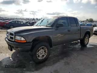 2001 Dodge Dakota Sport z VIN 1B7HG2AN91S333999, wystawiony jako Copart lot #73388754 z przebiegiem 202 759 mil mil oraz Szkoda całkowita • Salvage title. Historia ofert i sprzedaży dostępna na DreamBid. Obrazek 1.