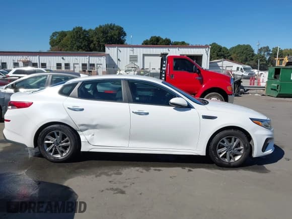 ✅ 2019 Kia Optima LX • VIN: 5XXGT4L35KG287923 • Лот: 43468113. Опубликован ранее на IAAI с пробегом 116 064 миль. Бесплатный доступ к архиву аукционных продаж из США и подробный отчёт об истории автомобиля на DreamBid. Изображение 13.