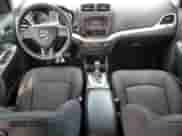 2013 Dodge Journey American Value with VIN 3C4PDCAB0DT575812, listed as a Copart auction lot 86771425 with 113,450 mi miles and Salvage title. Bid and sale history available at DreamBid. Image 8.