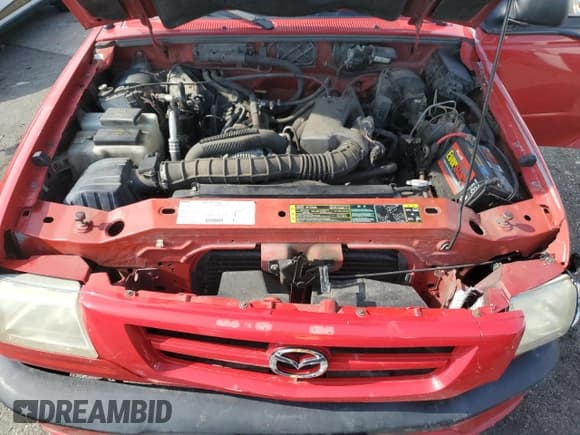 ✅ 2003 Mazda B-Series DS • VIN: 4F4YR16V93TM15362 • Lot: 64300665. Wystawiony na Copart z przebiegiem 100 772 mil. Bezpłatny archiwum sprzedaży aukcyjnych z USA i szczegółowy raport historii pojazdu na DreamBid. Zdjęcie 11.