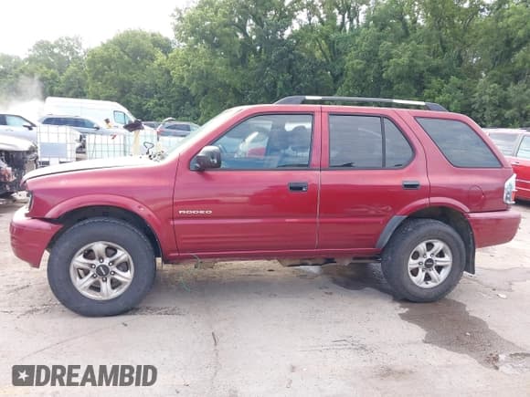 ✅ 2004 Isuzu Rodeo S • VIN: 4S2CK58Y444303591 • Lot: 42707772. Listed on IAAI with 156,792 mi. Free auction sales archive from the USA and detailed vehicle history report at DreamBid. Image 15.