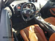 ✅ 2009 Nissan 370Z • VIN: JN1AZ44EX9M404083 • Lot: 91008375. Listed on Copart with 185,773 mi. Free auction sales archive from the USA and detailed vehicle history report at DreamBid. Image 8.