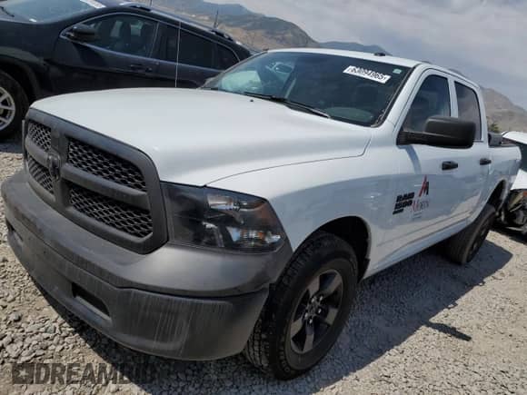 2023 Ram 1500 Tradesman z VIN 3C6RR7KG4PG668123, wystawiony jako Copart lot #63094965 z przebiegiem 21 038 mil mil oraz Szkoda całkowita • Salvage title. Historia ofert i sprzedaży dostępna na DreamBid. Obrazek 1.