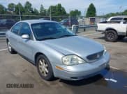 ✅ 2003 Mercury Sable GS • VIN: 1MEFM50U33A633023 • Lot: 42668203. Listed on IAAI with 115,555 mi. Free auction sales archive from the USA and detailed vehicle history report at DreamBid. Image 1.