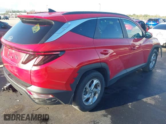 2022 Hyundai Tucson SEL with VIN 5NMJB3AE5NH029012, listed as a IAAI auction lot 43400701 with 26,852 mi miles and . Bid and sale history available at DreamBid. Image 4.