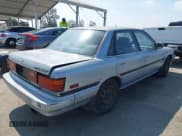 ✅ 1988 Toyota Camry LE • VIN: JT2SV22EXJ3305934 • Lot: 42737343. Wystawiony na IAAI z przebiegiem 256 096 mil. Bezpłatny archiwum sprzedaży aukcyjnych z USA i szczegółowy raport historii pojazdu na DreamBid. Zdjęcie 4.