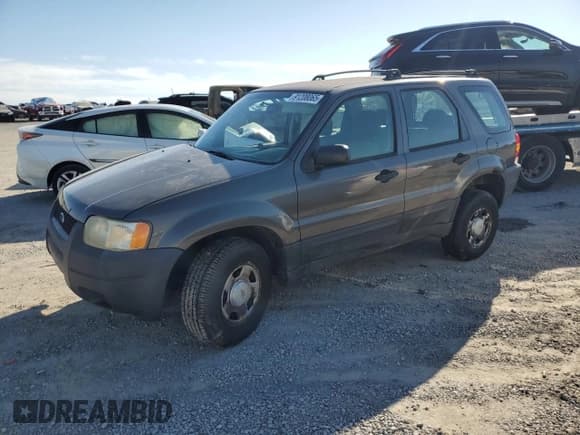 ✅ 2003 Ford Escape XLS Popular • VIN: 1FMYU921X3KB87480 • Lot: 91208065. Listed on Copart with 180,153 mi. Free auction sales archive from the USA and detailed vehicle history report at DreamBid. Image 1.