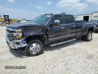 2015 Chevrolet Silverado 3500HD LTZ with VIN 1GC4K0E80FF680420, listed as a Copart auction lot 60500055 with 57,136 mi miles and Salvage title. Bid and sale history available at DreamBid. Image 1.