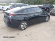 ✅ 2017 Toyota Prius Three • VIN: JTDKARFU5H3039617 • Lot: 43343112. Wystawiony na IAAI z przebiegiem 146 702 mil. Bezpłatny archiwum sprzedaży aukcyjnych z USA i szczegółowy raport historii pojazdu na DreamBid. Zdjęcie 4.