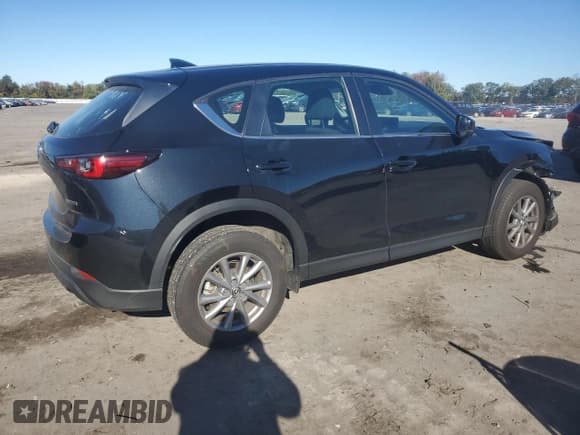 ✅ 2023 Mazda CX-5 S • VIN: JM3KFBAM0P0182840 • Лот: 86800735. Опубликован ранее на Copart с пробегом 22 570 миль. Бесплатный доступ к архиву аукционных продаж из США и подробный отчёт об истории автомобиля на DreamBid. Изображение 3.
