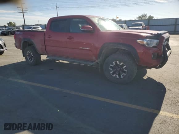 ✅ 2018 Toyota Tacoma TRD Off Road • VIN: 3TMDZ5BN6JM048050 • Lot: 85717605. Listed on Copart with 115,626 mi. Free auction sales archive from the USA and detailed vehicle history report at DreamBid. Image 4.