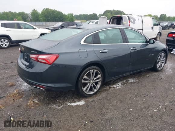2020 Chevrolet Malibu Premier with VIN 1G1ZE5SX1LF002060, listed as a IAAI auction lot 42194505 with 146,111 mi miles and . Bid and sale history available at DreamBid. Image 4.