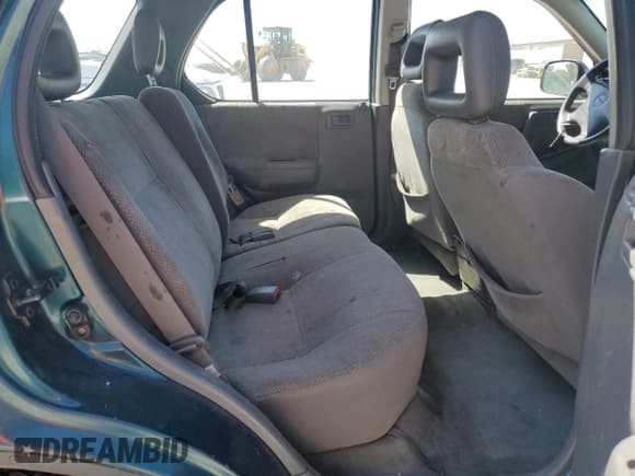 ✅ 1999 Isuzu Rodeo S • VIN: 4S2CM58W4X4330190 • Lot: 81996975. Wystawiony na Copart z przebiegiem 167 032 mil. Bezpłatny archiwum sprzedaży aukcyjnych z USA i szczegółowy raport historii pojazdu na DreamBid. Zdjęcie 11.