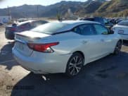 ✅ 2016 Nissan Maxima Platinum • VIN: 1N4AA6AP2GC409454 • Lot: 41667739. Listed on IAAI with 91,132 mi. Free auction sales archive from the USA and detailed vehicle history report at DreamBid. Image 4.