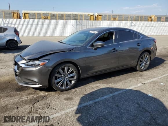 ✅ 2019 Mazda 6 Grand Touring • VIN: JM1GL1TY1K1504728 • Лот: 71084945. Опубликован ранее на Copart с пробегом 60 078 миль. Бесплатный доступ к архиву аукционных продаж из США и подробный отчёт об истории автомобиля на DreamBid. Изображение 1.