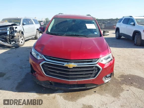 ✅ 2020 Chevrolet Traverse LT Cloth • VIN: 1GNERGKW9LJ309932 • Lot: 42022930. Listed on IAAI with 113,753 mi. Free auction sales archive from the USA and detailed vehicle history report at DreamBid. Image 12.