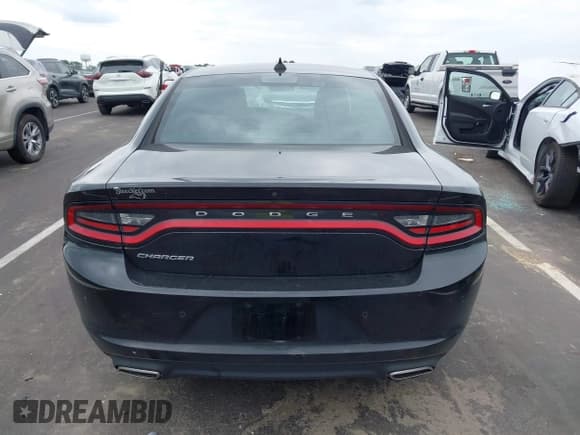 ✅ 2023 Dodge Charger SXT • VIN: 2C3CDXBG5PH579520 • Lot: 43245472. Listed on IAAI with 59,873 mi. Free auction sales archive from the USA and detailed vehicle history report at DreamBid. Image 16.