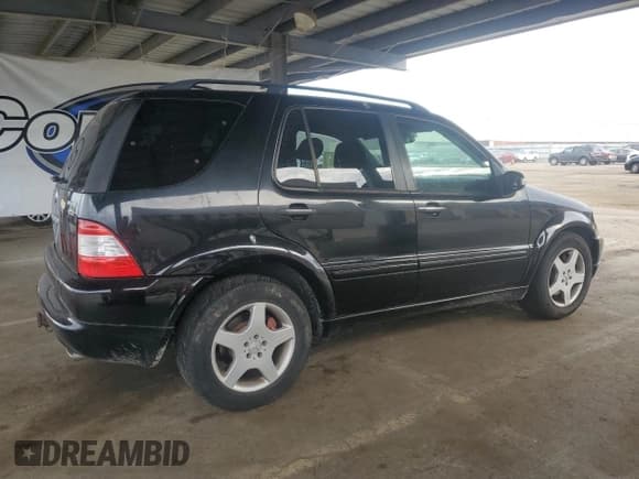 ✅ 2002 Mercedes-Benz M AMG • VIN: 4JGAB74EX2A297171 • Lot: 81686405. Listed on Copart with 180,496 mi. Free auction sales archive from the USA and detailed vehicle history report at DreamBid. Image 3.