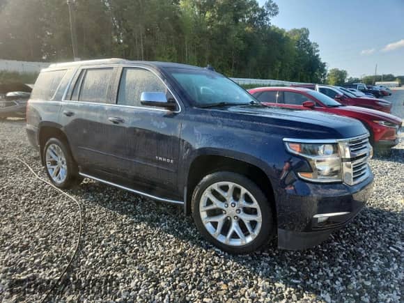 2020 Chevrolet Tahoe Premier with VIN 1GNSKCKC5LR114403, listed as a Copart auction lot 65006725 with 76,492 mi miles and Salvage title. Bid and sale history available at DreamBid. Image 4.
