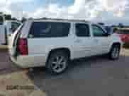 2008 Chevrolet Suburban LTZ with VIN 1GNFK16308R202315, listed as a Copart auction lot 84787765 with 201,793 mi miles and Salvage title. Bid and sale history available at DreamBid. Image 3.