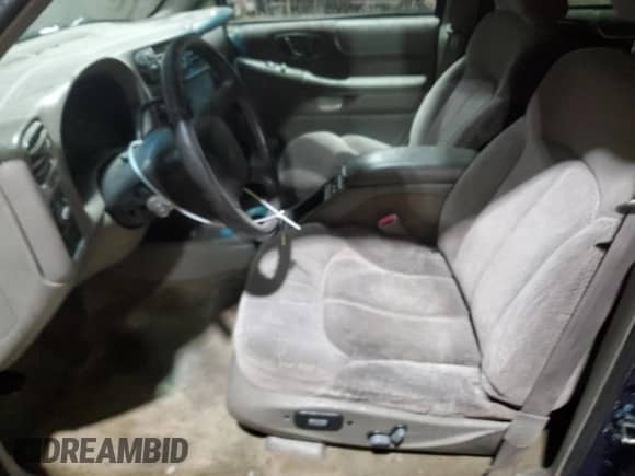 2001 Chevrolet Blazer LT with VIN 1GNDT13W912134288, listed as a Copart auction lot 87112824 with 152,925 mi miles and Salvage title. Bid and sale history available at DreamBid. Image 7.