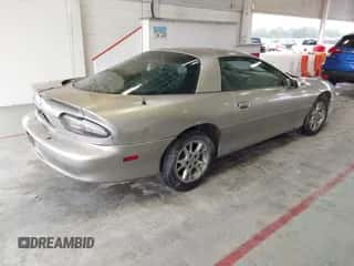 2002 Chevrolet Camaro z VIN 2G1FP22K722101224, wystawiony jako IAAI lot #41644587 z przebiegiem 223 584 mil mil oraz . Historia ofert i sprzedaży dostępna na DreamBid. Obrazek 4.
