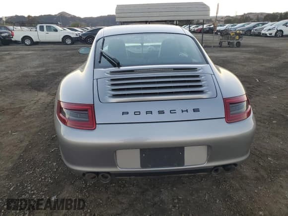 ✅ 2005 Porsche 911 Carrera 997 • VIN: WP0AA29975S716954 • Lot: 79488564. Wystawiony na Copart z przebiegiem 94 989 mil. Bezpłatny archiwum sprzedaży aukcyjnych z USA i szczegółowy raport historii pojazdu na DreamBid. Zdjęcie 6.
