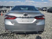 ✅ 2024 Toyota Camry SE • VIN: 4T1G11AK4RU849826 • Lot: 93326105. Wystawiony na Copart z przebiegiem 44 971 mil. Bezpłatny archiwum sprzedaży aukcyjnych z USA i szczegółowy raport historii pojazdu na DreamBid. Zdjęcie 6.