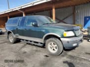 ✅ 2001 Ford F-150 XL • VIN: 2FTRX08LX1CA23541 • Лот: 91902115. Опубликован ранее на Copart с пробегом 124 206 миль. Бесплатный доступ к архиву аукционных продаж из США и подробный отчёт об истории автомобиля на DreamBid. Изображение 4.