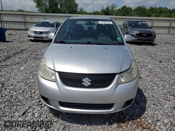 ✅ 2012 Suzuki SX4 LE • VIN: JS2YC5A34C6305573 • Лот: 61501735. Опубликован ранее на Copart с пробегом 123 367 миль. Бесплатный доступ к архиву аукционных продаж из США и подробный отчёт об истории автомобиля на DreamBid. Изображение 5.