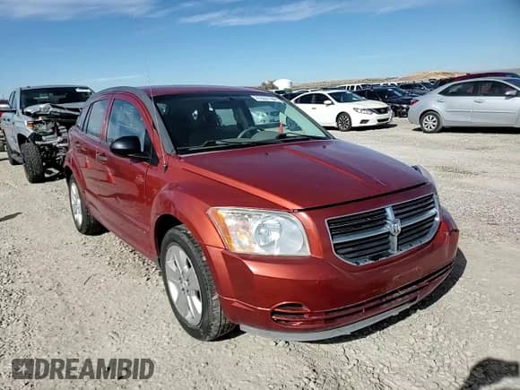 2007 Dodge Caliber SXT z VIN 1B3HB48BX7D587757, wystawiony jako Copart lot #77037124 z przebiegiem 168 505 mil mil oraz Szkoda całkowita • Salvage title. Historia ofert i sprzedaży dostępna na DreamBid. Obrazek 11.