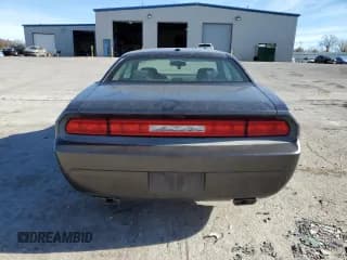 ✅ 2014 Dodge Challenger SXT • VIN: 2C3CDYAG5EH293641 • Lot: 84481854. Wystawiony na Copart z przebiegiem 121 234 mil. Bezpłatny archiwum sprzedaży aukcyjnych z USA i szczegółowy raport historii pojazdu na DreamBid. Zdjęcie 6.