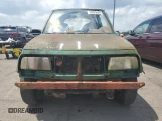 ✅ 1994 Geo Tracker • VIN: 2CNBE18U4R6933505 • Lot: 68421924. Wystawiony na Copart z przebiegiem 203 558 mil. Bezpłatny archiwum sprzedaży aukcyjnych z USA i szczegółowy raport historii pojazdu na DreamBid. Zdjęcie 5.