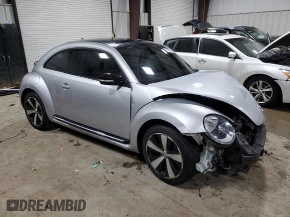 ✅ 2012 Volkswagen Beetle Turbo • VIN: 3VWVA7AT8CM628164 • Lot: 85227914. Wystawiony na Copart z przebiegiem 89 403 mil. Bezpłatny archiwum sprzedaży aukcyjnych z USA i szczegółowy raport historii pojazdu na DreamBid. Zdjęcie 4.