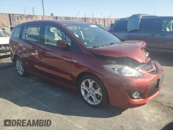 ✅ 2008 Mazda 5 Touring • VIN: JM1CR29L980323499 • Lot: 81774604. Listed on Copart with 48,496 mi. Free auction sales archive from the USA and detailed vehicle history report at DreamBid. Image 4.