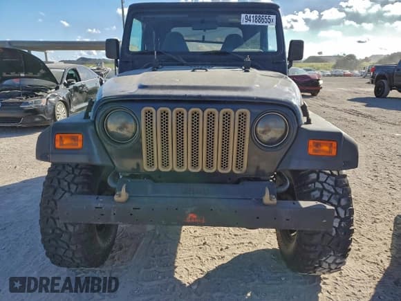 ✅ 2002 Jeep Wrangler Sahara • VIN: 1J4FA59SX2P739910 • Lot: 94188655. Listed on Copart with 109,888 mi. Free auction sales archive from the USA and detailed vehicle history report at DreamBid. Image 5.