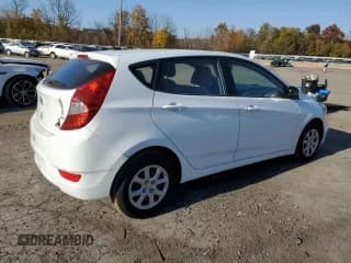 ✅ 2014 Hyundai Accent GS • VIN: KMHCT5AE1EU154305 • Лот: 77044364. Опубликован ранее на Copart с пробегом 156 123 миль. Бесплатный доступ к архиву аукционных продаж из США и подробный отчёт об истории автомобиля на DreamBid. Изображение 3.