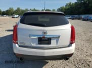 ✅ 2011 Cadillac SRX Premium Collection • VIN: 3GYFNFEY1BS615935 • Lot: 70628525. Listed on Copart with 131,697 mi. Free auction sales archive from the USA and detailed vehicle history report at DreamBid. Image 6.