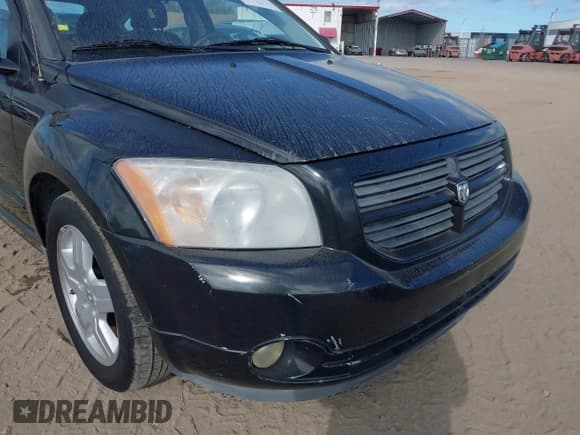 ✅ 2008 Dodge Caliber SXT • VIN: 1B3HB48B98D506460 • Lot: 41829536. Listed on IAAI with 61,826 mi. Free auction sales archive from the USA and detailed vehicle history report at DreamBid. Image 13.