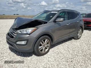 ✅ 2015 Hyundai Santa Fe • VIN: 5XYZW4LA7FG257189 • Лот: 70474313. Опубликован ранее на Copart с пробегом 62 512 миль. Бесплатный доступ к архиву аукционных продаж из США и подробный отчёт об истории автомобиля на DreamBid. Изображение 1.