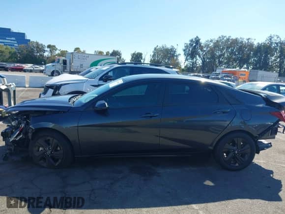 2021 Hyundai Elantra SEL z VIN 5NPLM4AG0MH052984, wystawiony jako IAAI lot #43313010 z przebiegiem 92 117 mil mil oraz . Historia ofert i sprzedaży dostępna na DreamBid. Obrazek 15.