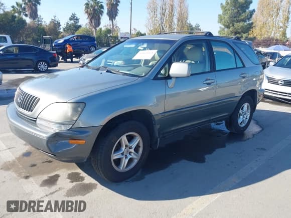 ✅ 2000 Lexus RX 300 • VIN: JT6GF10U0Y0070882 • Лот: 43809034. Опубликован ранее на IAAI с пробегом 165 627 миль. Бесплатный доступ к архиву аукционных продаж из США и подробный отчёт об истории автомобиля на DreamBid. Изображение 19.