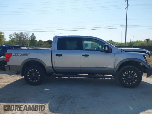 ✅ 2018 Nissan Titan Pro-4X • VIN: 1N6AA1E51JN551695 • Lot: 43365881. Listed on IAAI with 114,790 mi. Free auction sales archive from the USA and detailed vehicle history report at DreamBid. Image 14.