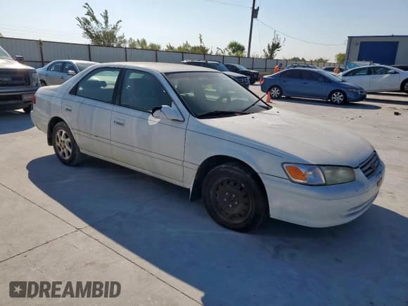 ✅ 2001 Toyota Camry LE • VIN: JT2BG22K810545789 • Lot: 84904845. Listed on Copart with 300,403 mi. Free auction sales archive from the USA and detailed vehicle history report at DreamBid. Image 4.