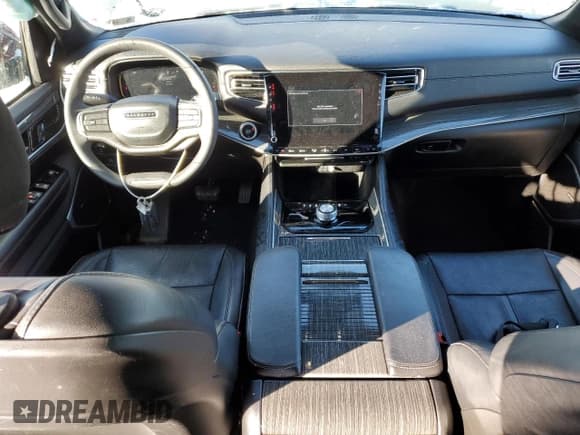 ✅ 2022 Jeep Wagoneer Series II • VIN: 1C4SJVBT3NS182718 • Lot: 88100715. Listed on Copart with 80,536 mi. Free auction sales archive from the USA and detailed vehicle history report at DreamBid. Image 8.