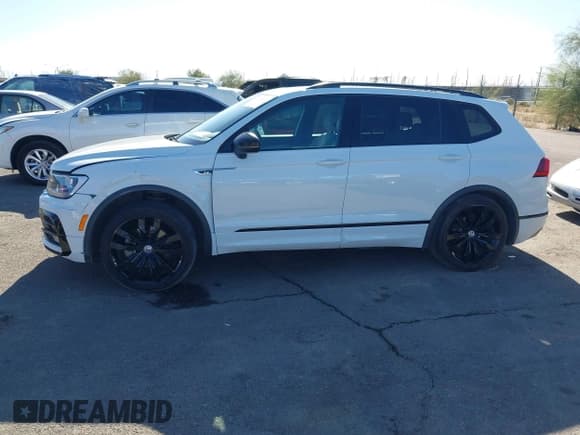 ✅ 2021 Volkswagen Tiguan SE • VIN: 3VV2B7AX2MM017362 • Lot: 41156972. Wystawiony na IAAI z przebiegiem 116 497 mil. Bezpłatny archiwum sprzedaży aukcyjnych z USA i szczegółowy raport historii pojazdu na DreamBid. Zdjęcie 14.
